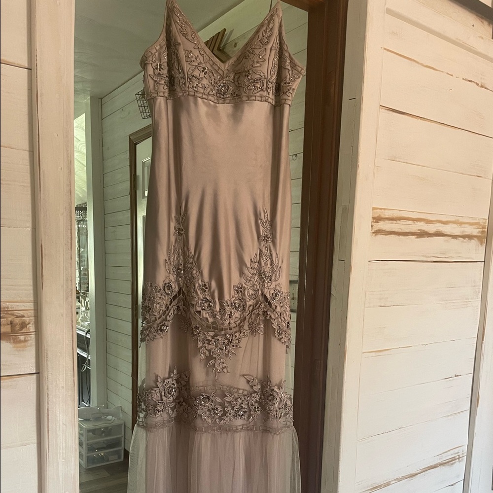 Gorgeous sleek full length dress. Beads and sequins